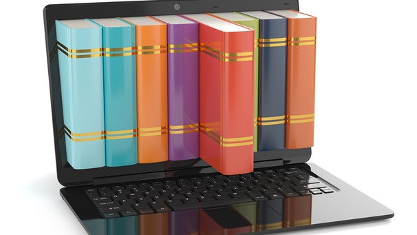 Symbolbild Digitaler Lesesaal: Ein Laptop, aus dessen Bildschirm Bücher ragen. | Bild: colourbox.com